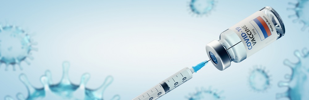 COVID-19 Coronavirus Vaccine and Syringe Concept Image.